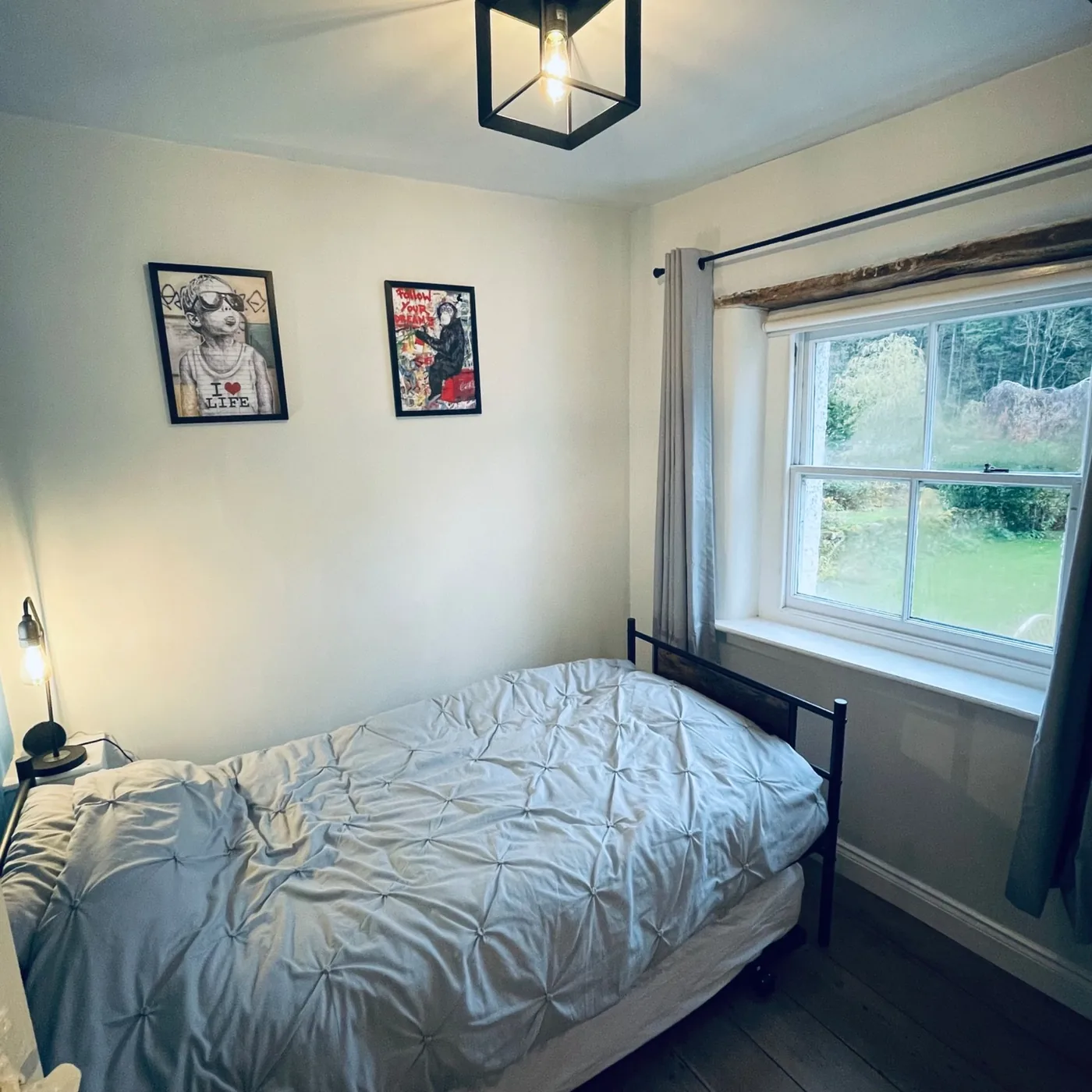 Riverside double bedroom overlooking the garden